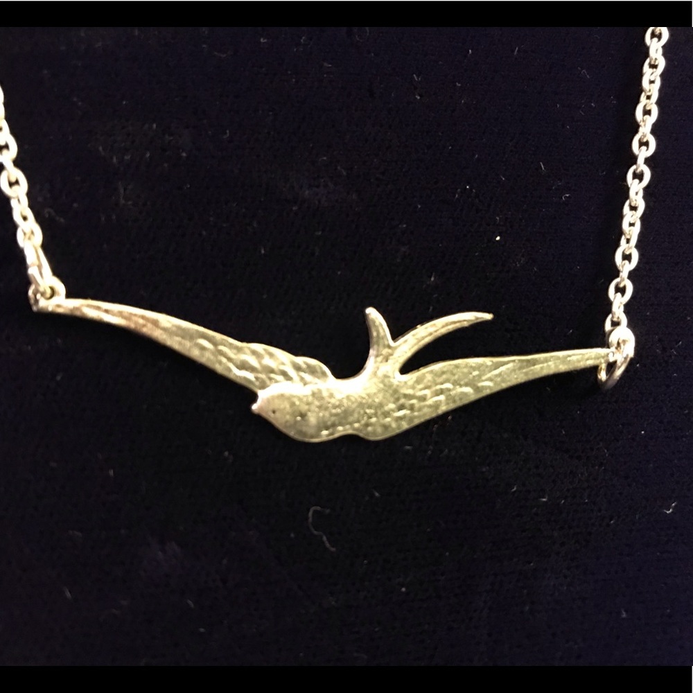 Pewter bird design on silver tone chain
